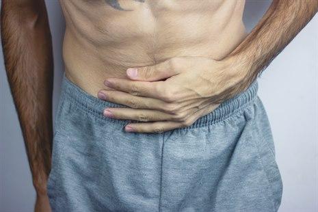 stomach abdominal pain man