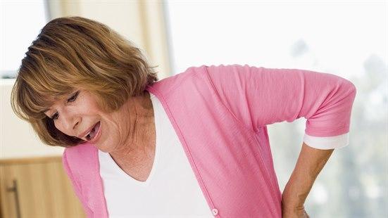 Middle-aged woman with pain