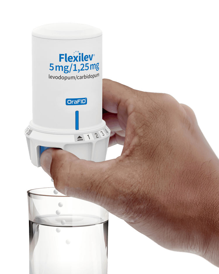 Illustrasjonsfotoet viser flexilev medisin og et vannglass 