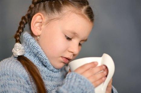 Young girl with sore throat